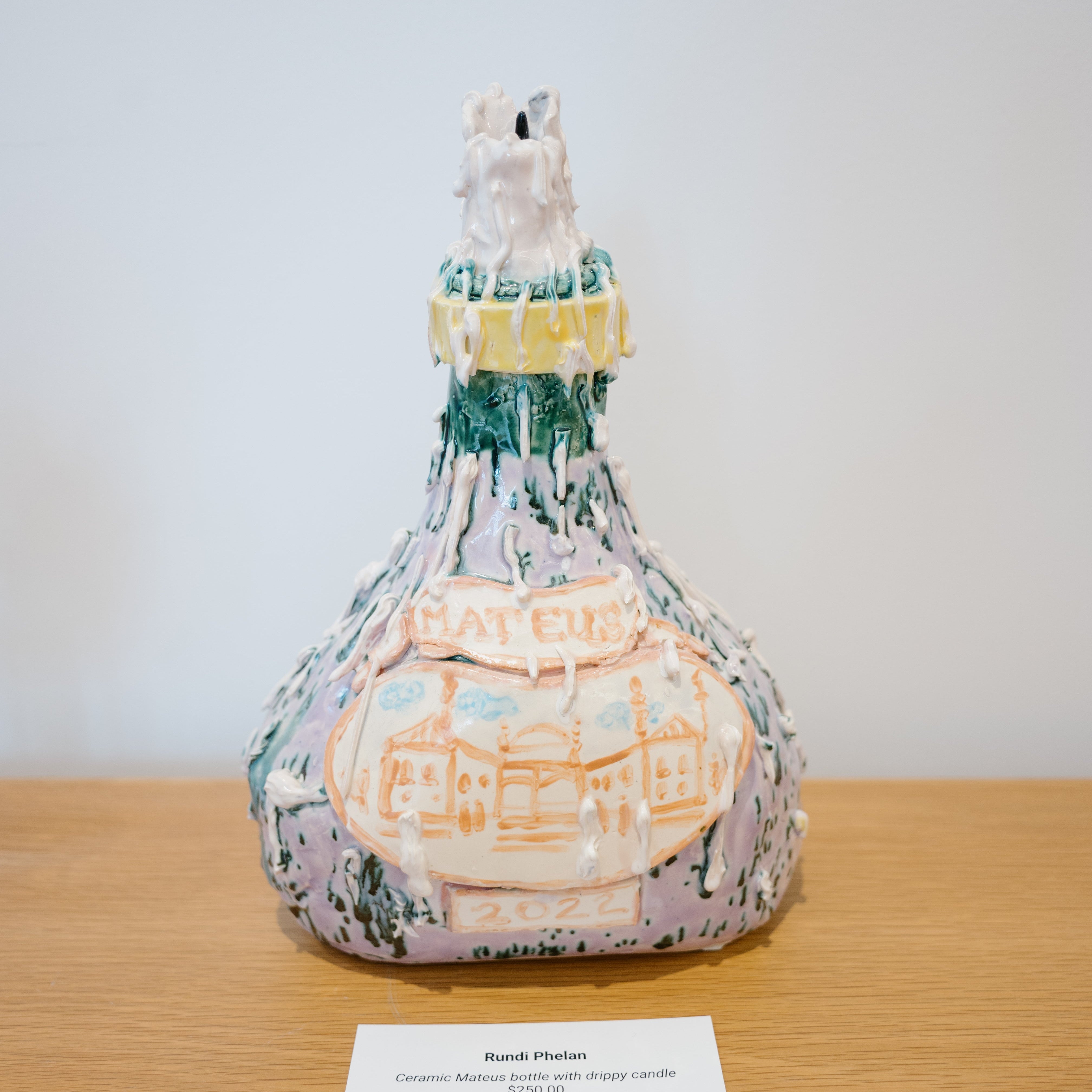 Ceramic Mateus bottle with drippy candle