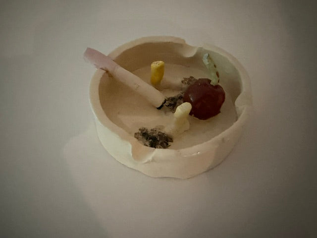 Ceramic round ashtray with cherry