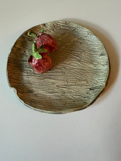 Ceramic plate with strawberries