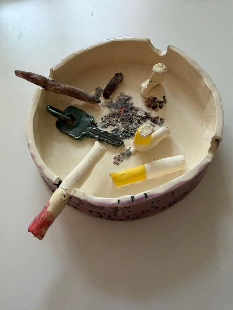 Ceramic ashtray with key and joint