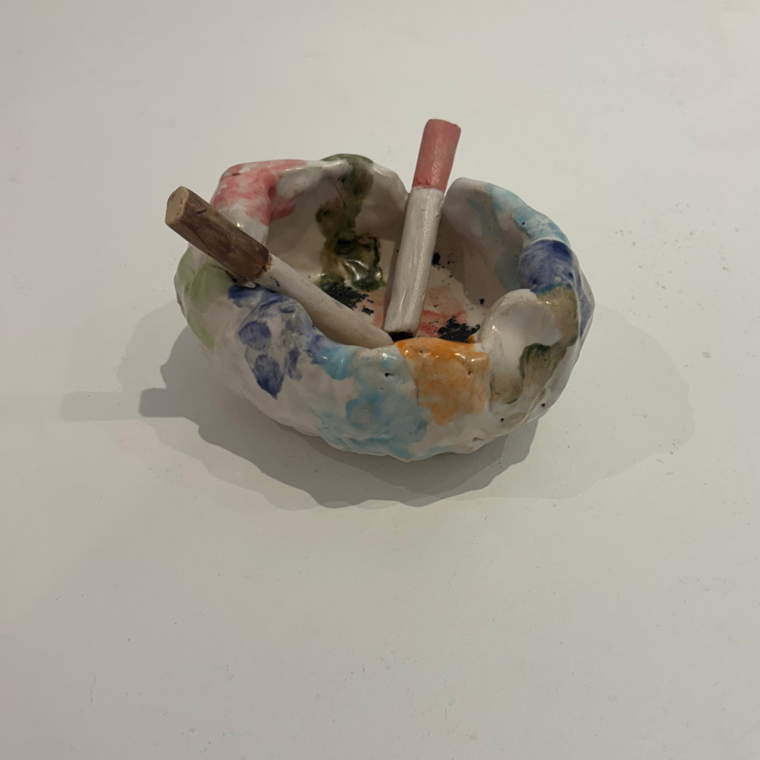 Colourful ceramic ashtray - oval with 2 cigarettes